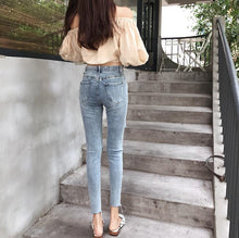 Load image into Gallery viewer, INSTOCK Korean Light Blue Ripped Slit Stretchable Slim Jeans Nine-quarter